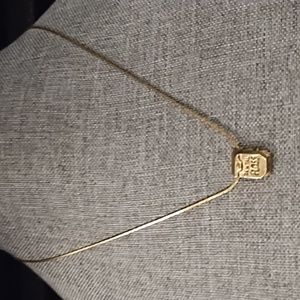 NWOT Dental Floss necklace